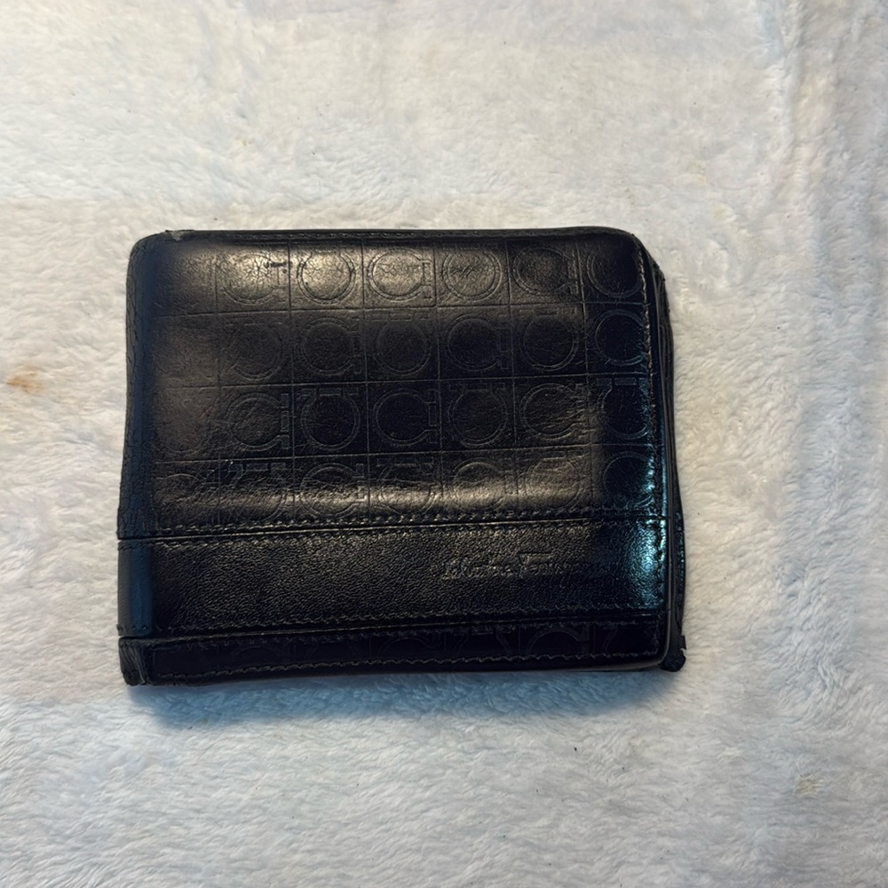 Salvador Ferragamo black bifold wallet.